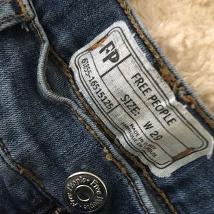 Free people distressed skinny jeans